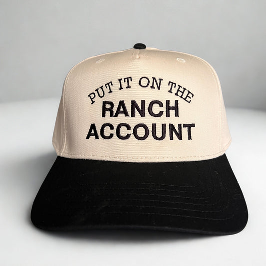PUT IT ON THE RANCH ACCOUNT TRUCKER HAT