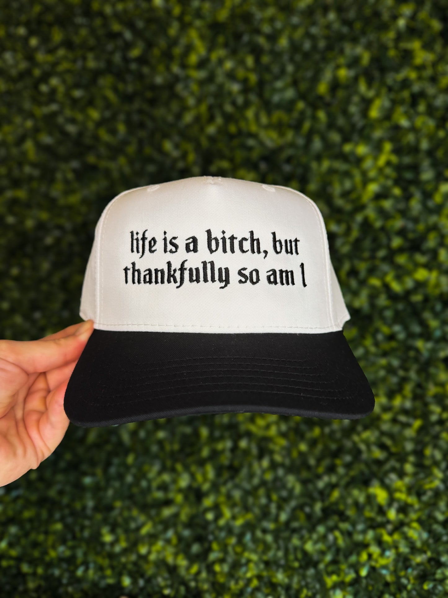 LIFE IS A B*TCH TRUCKER HAT