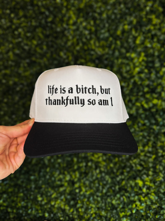 LIFE IS A B*TCH TRUCKER HAT