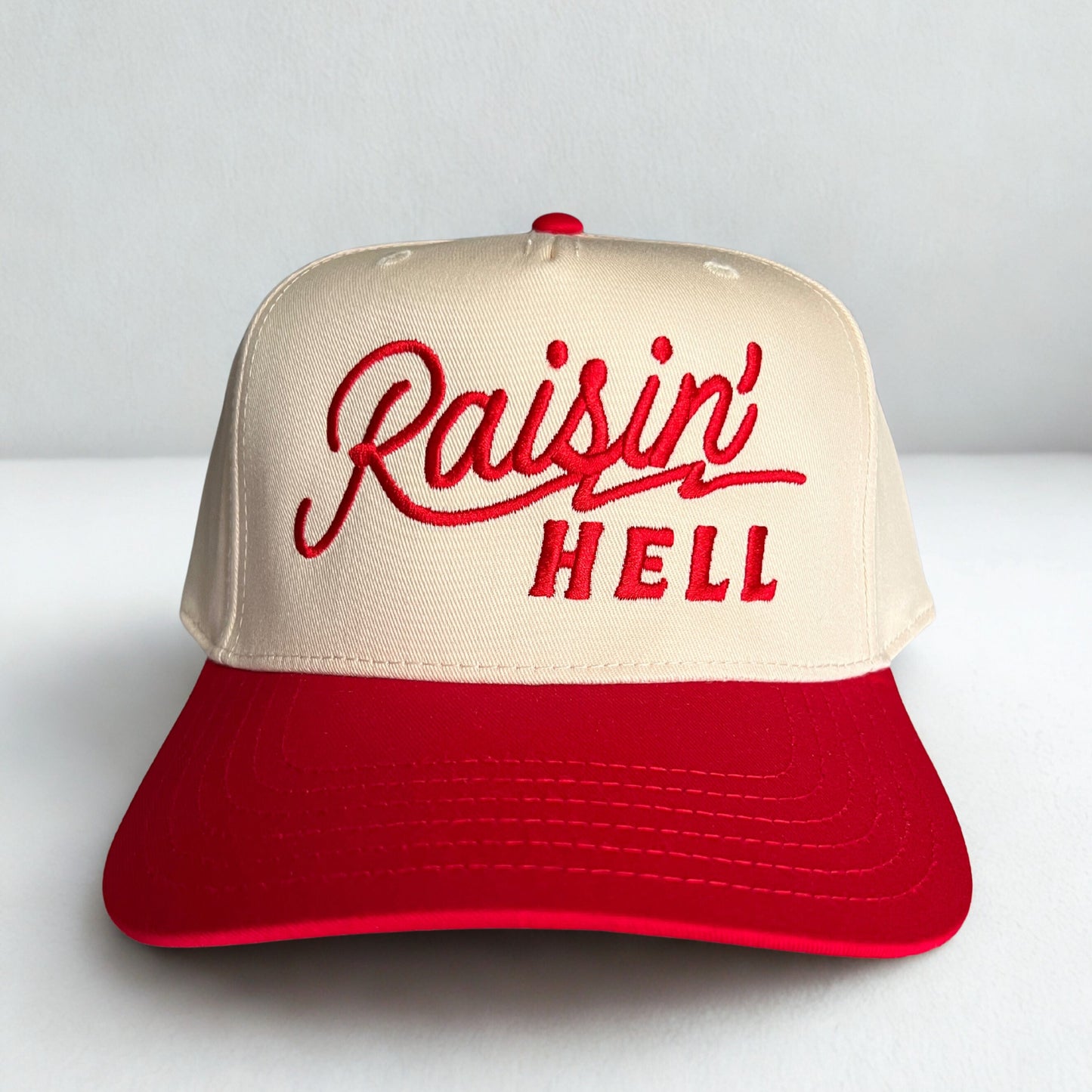 RAISIN' HELL TRUCKER HAT